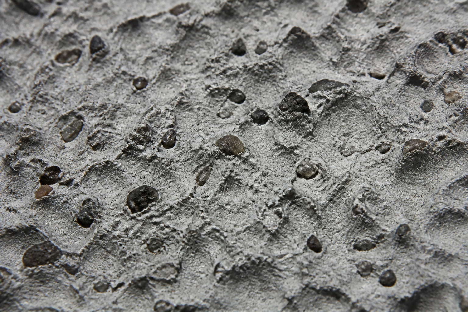 Photorealistic illustrative reference showing embedded abrasive on a protective coating system
