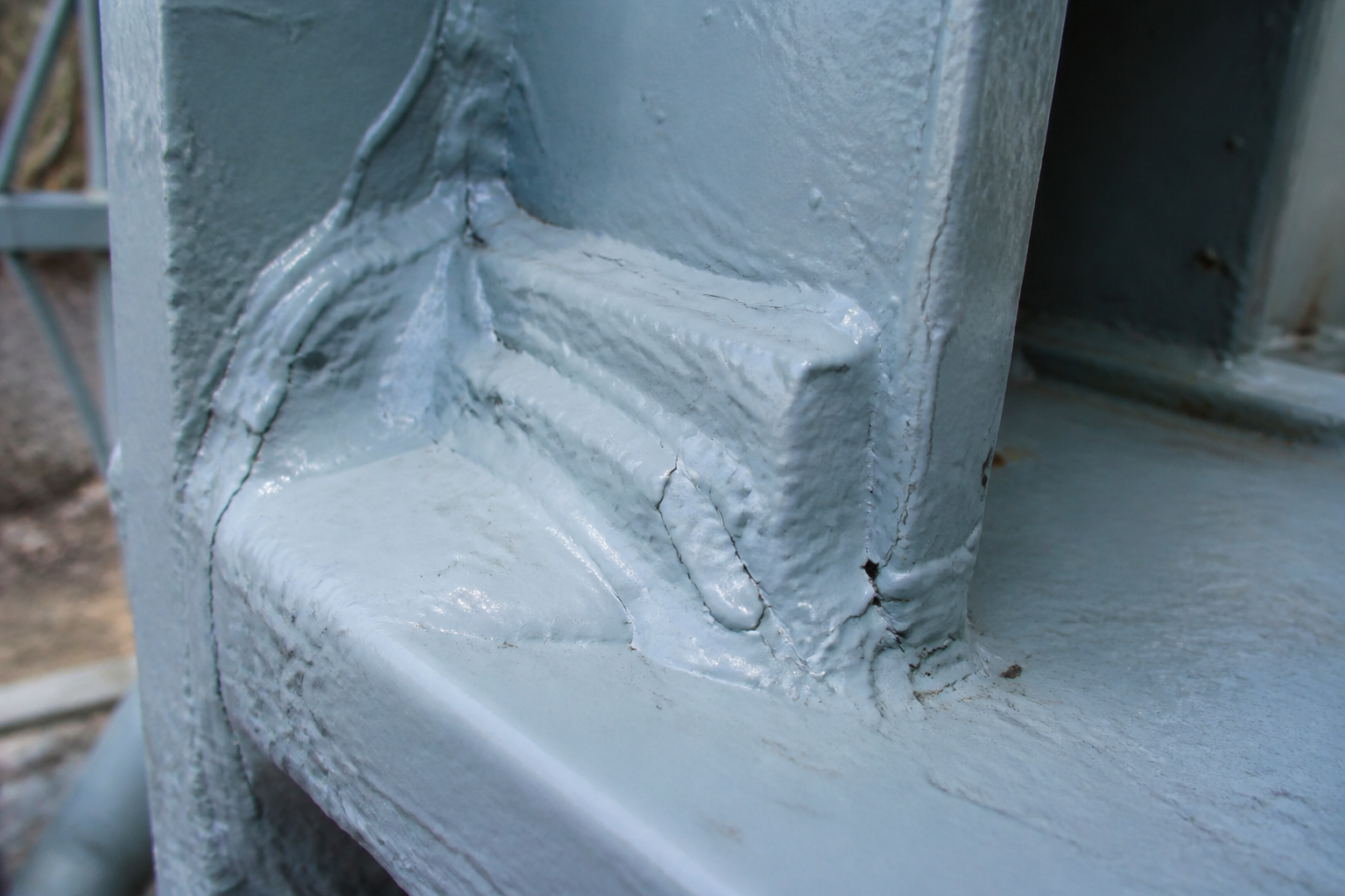 Photorealistic illustrative reference showing excessive dft on a protective coating system