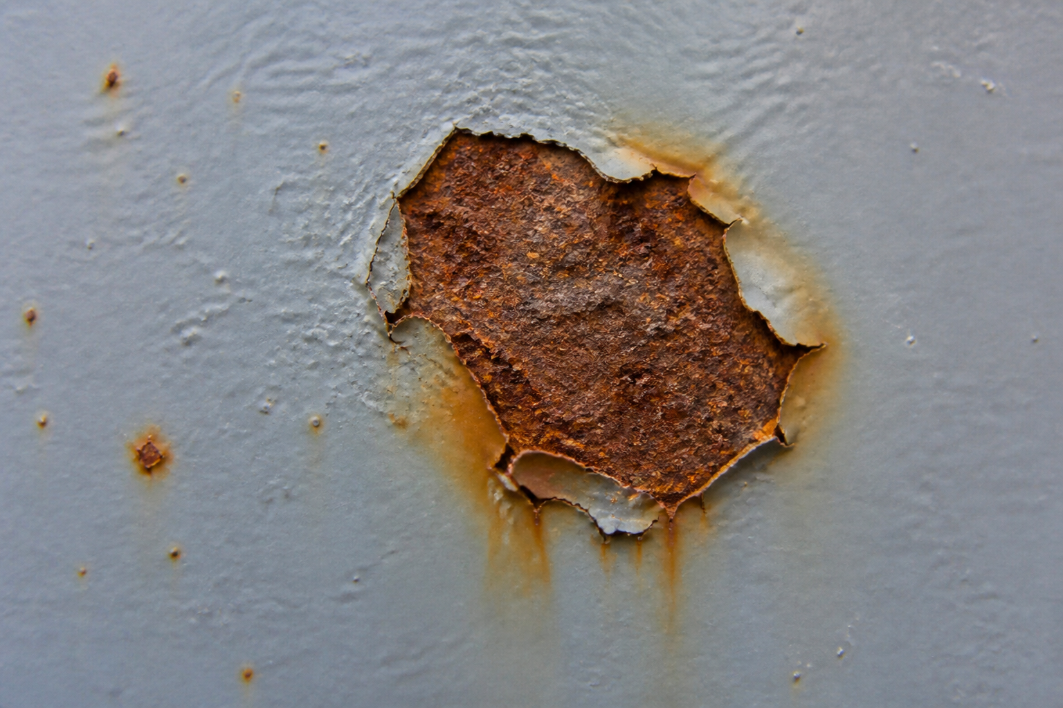 Photorealistic illustrative reference showing general corrosion on a protective coating system