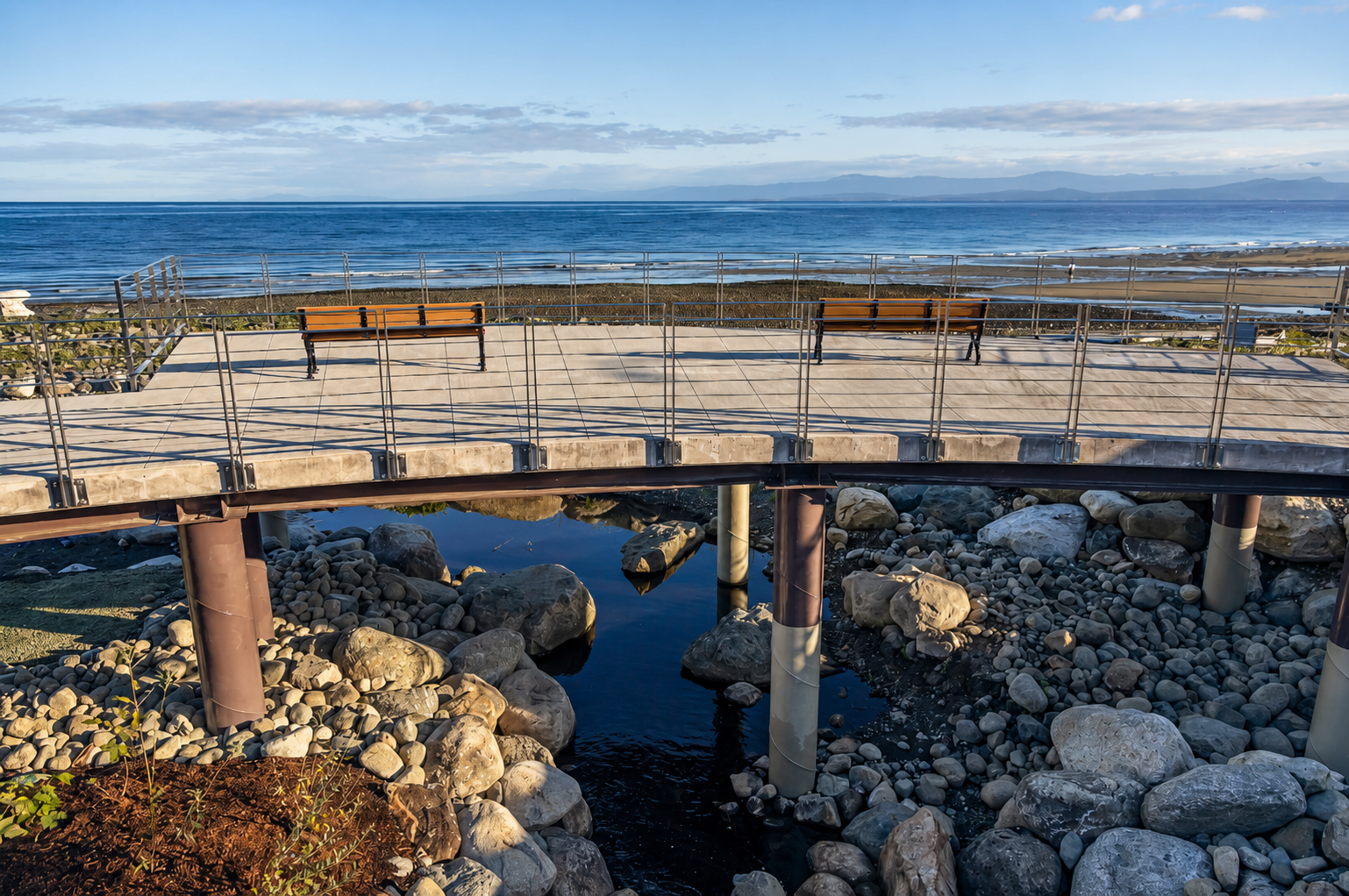 Coated structural steel supports beneath a coastal observation deck