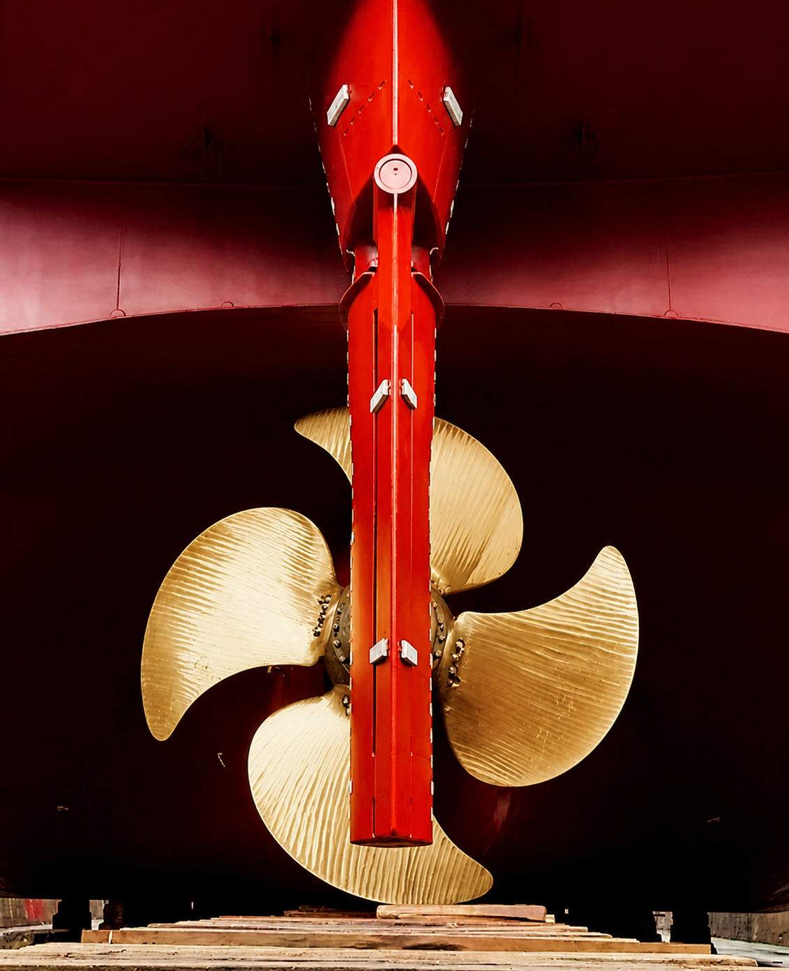 Coated marine rudder and propeller in drydock