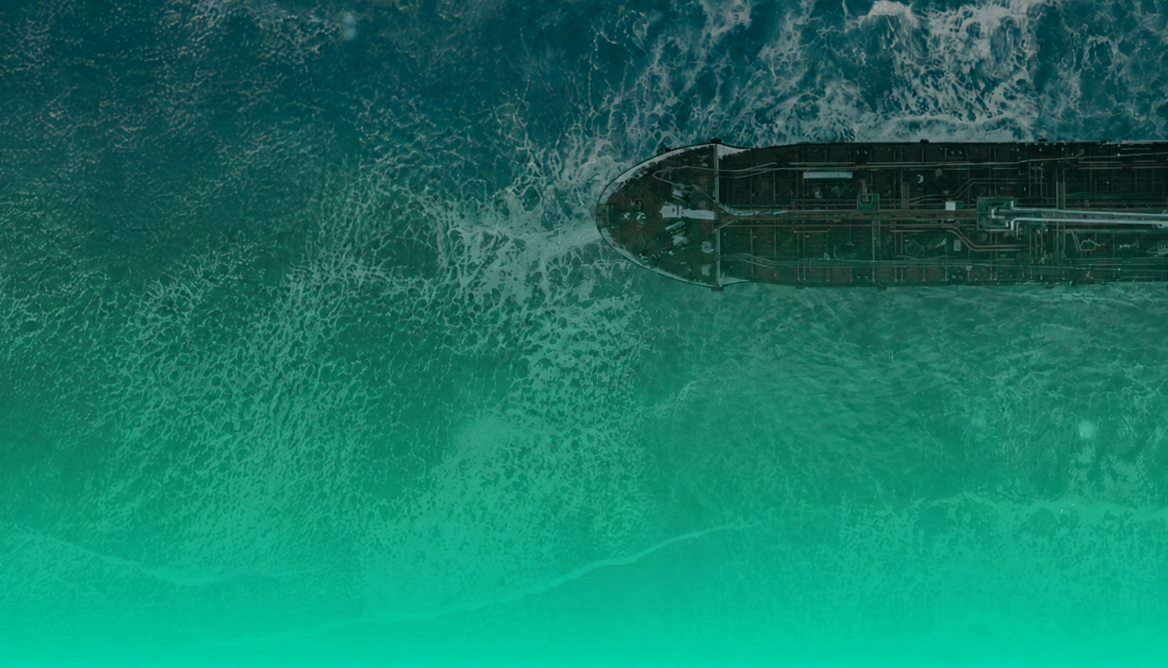 Commercial vessel viewed from above in open water